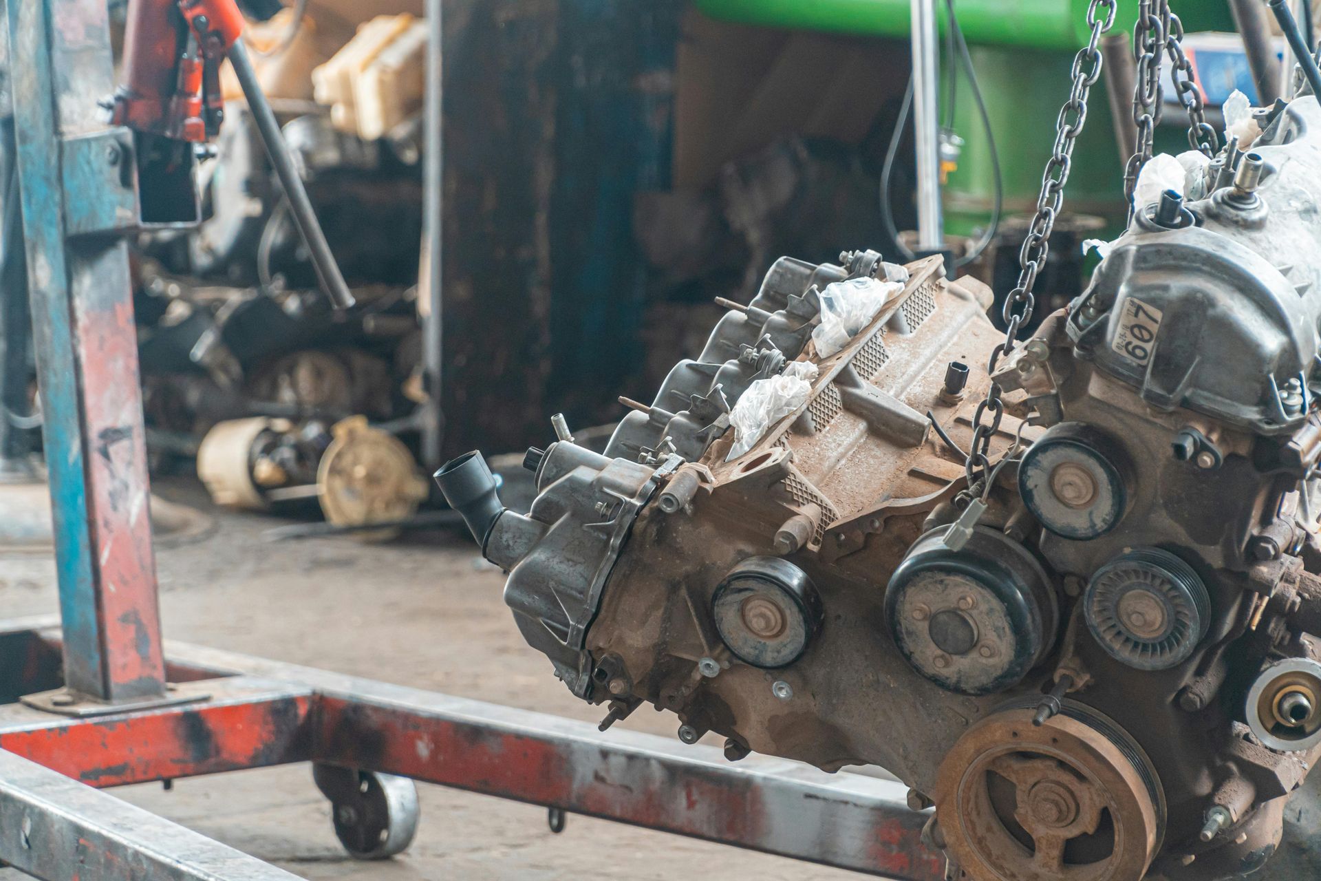 Engine Block On A Lift Ready For Auto Repair Work In A Shop | Norgren's Auto Center