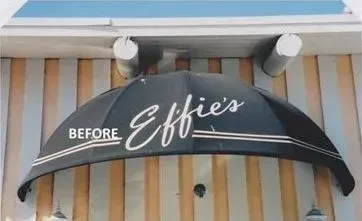 A black awning with the words `` before effie 's '' written on it.