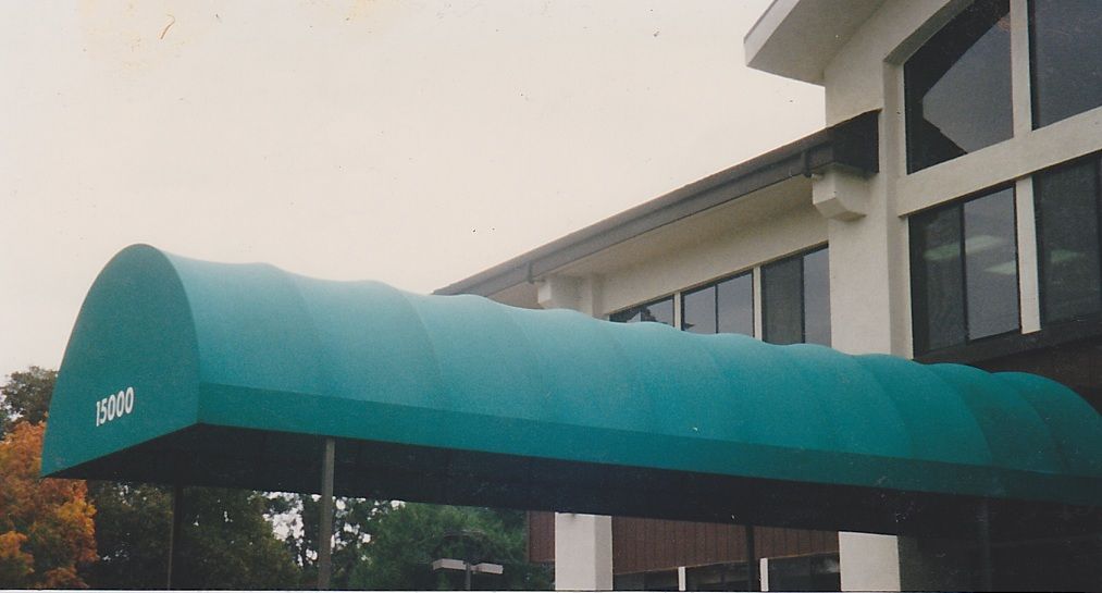 A before and after photo of a store with a blue awning.