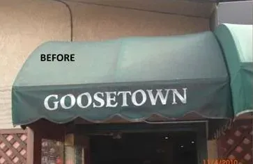 A green awning with the word goosetown on it.