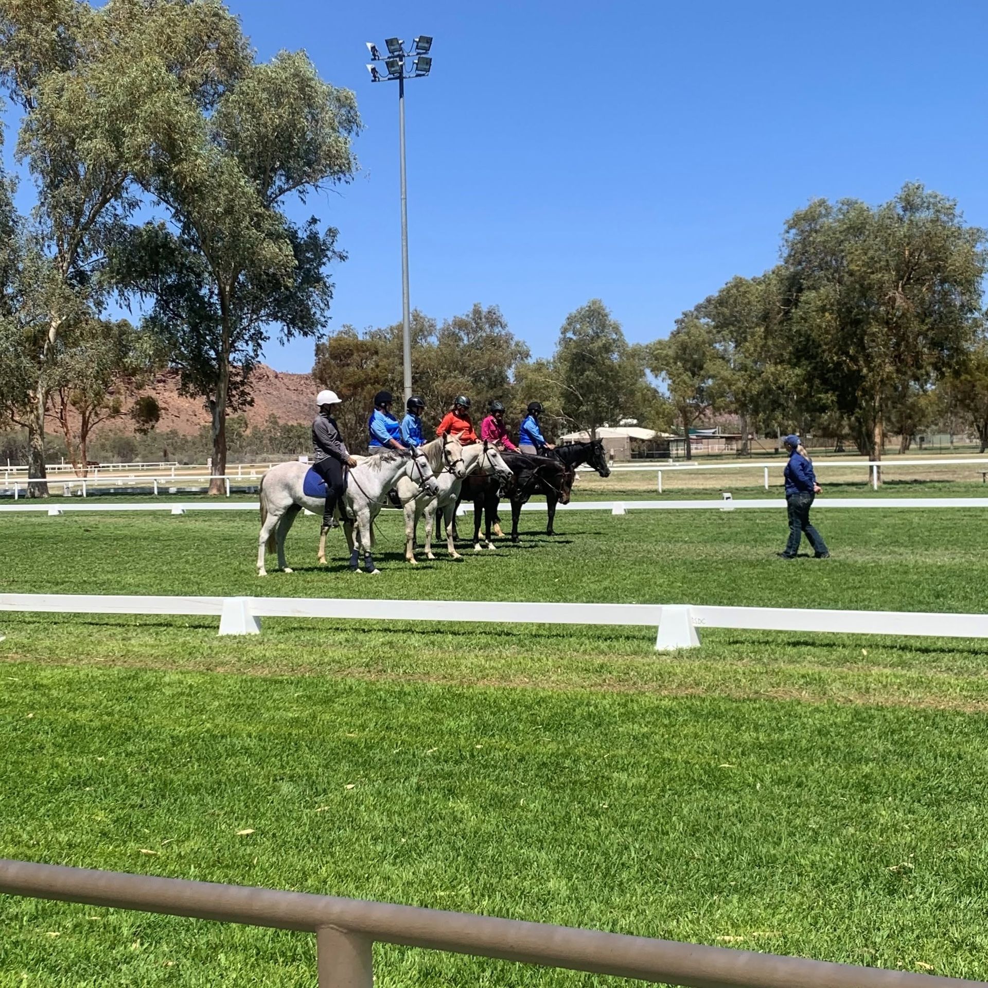 Jockeys on Horses Gathered on A Racetrack — Blatherskite Park in Ilparpa, NT