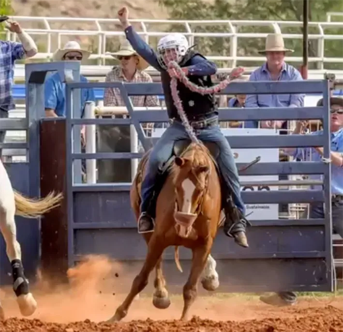 A Competitor Riding a Horse at a Rodeo — Blatherskite Park in Ilparpa, NT