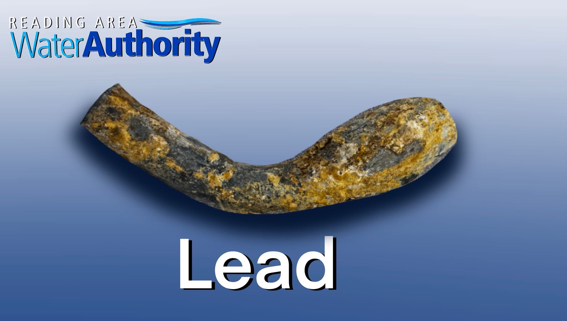 A corroded lead pipe with the word 