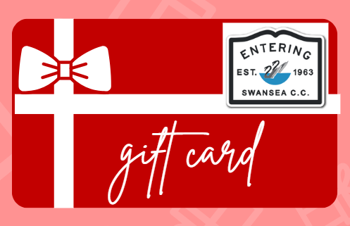 A red gift card with a white bow on a pink background.