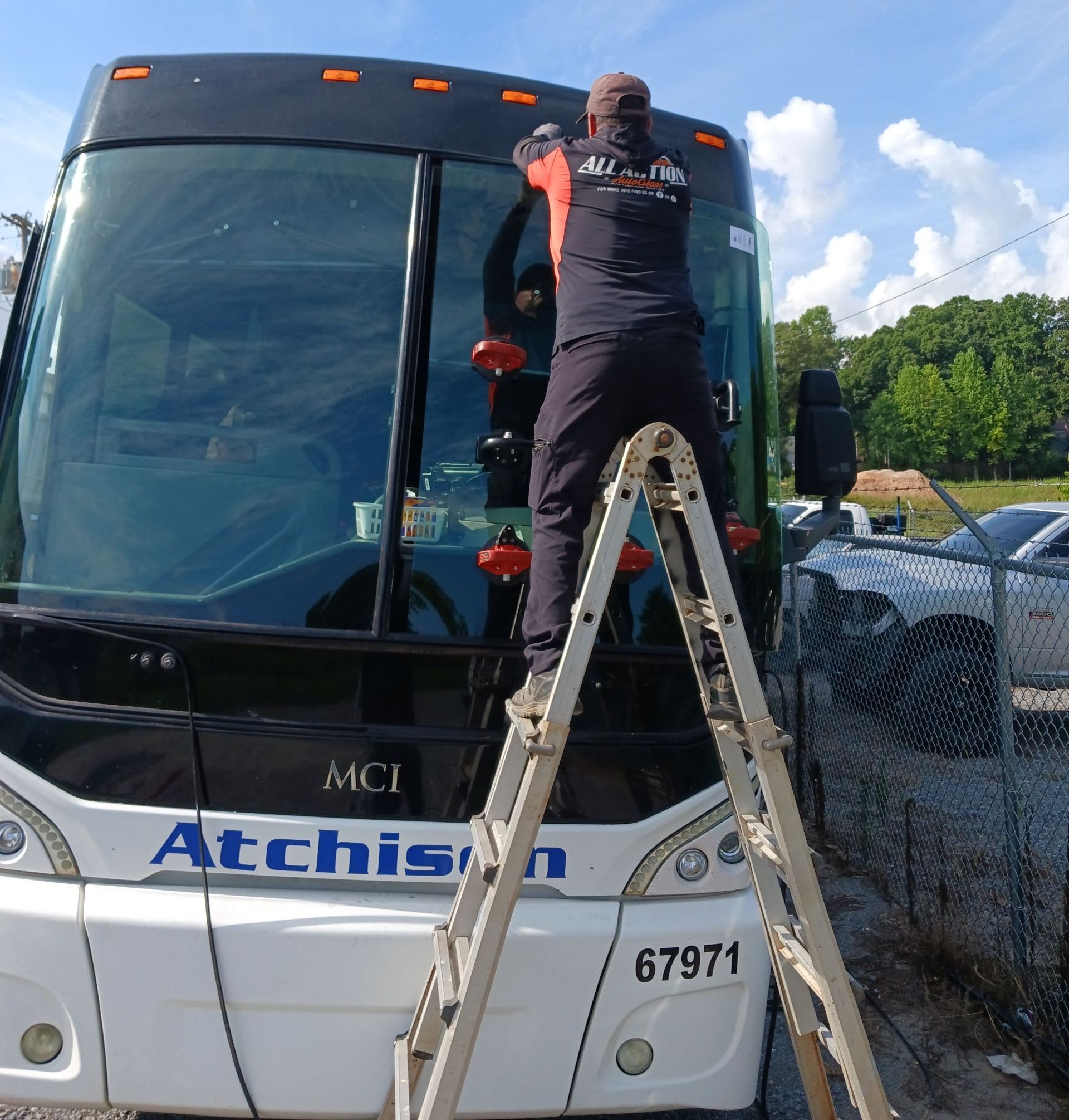 All Action Auto Glass Installing a Windshield Replacement on an RV Near Charlotte, NC