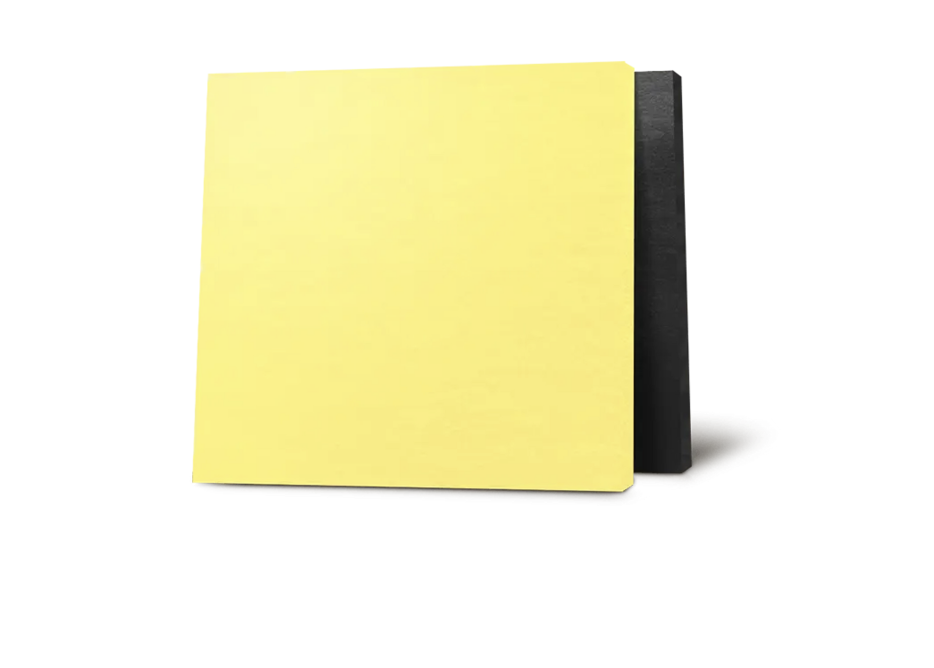A yellow piece of paper is sitting next to a black piece of paper.