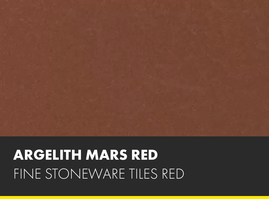 A close up of a stoneware tile in the color red