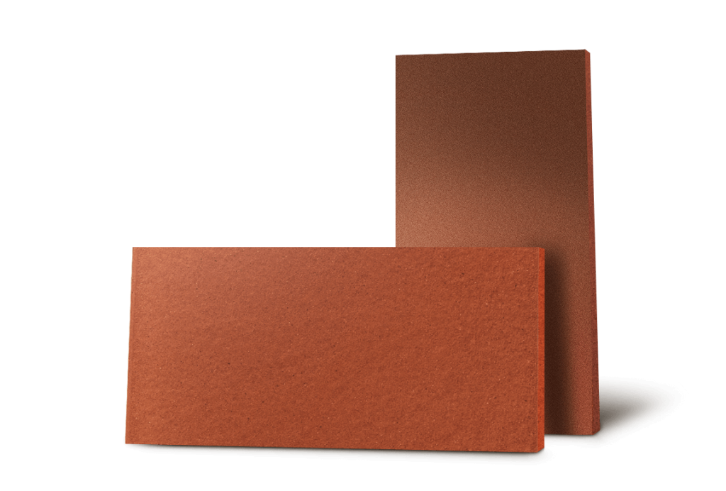 Two red bricks are stacked on top of each other on a white background
