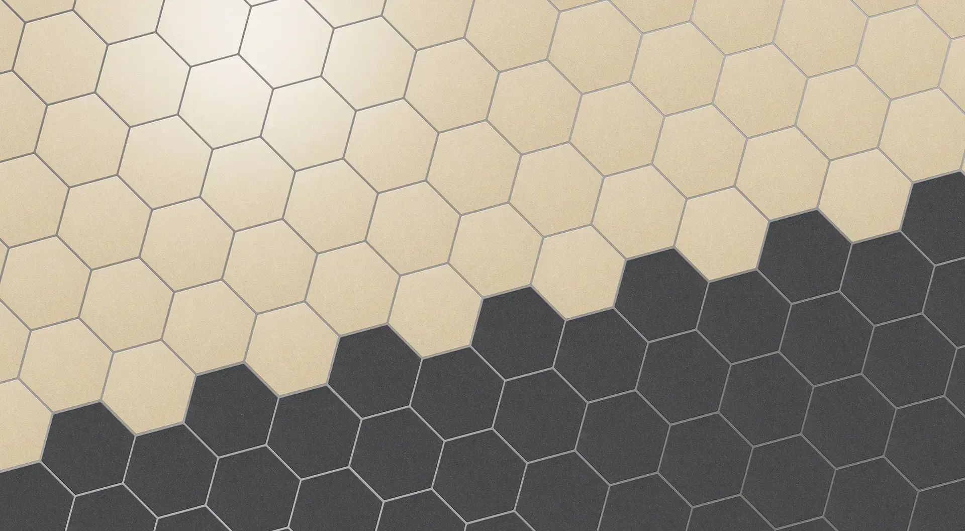 A repeating pattern of beige and dark gray hexagons separated by a diagonal line.