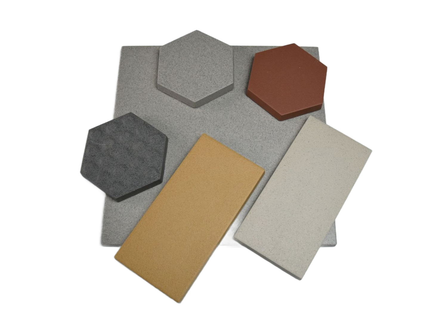 Assorted hexagonal and rectangular textured tiles in gray, beige, orange, and white on a white background