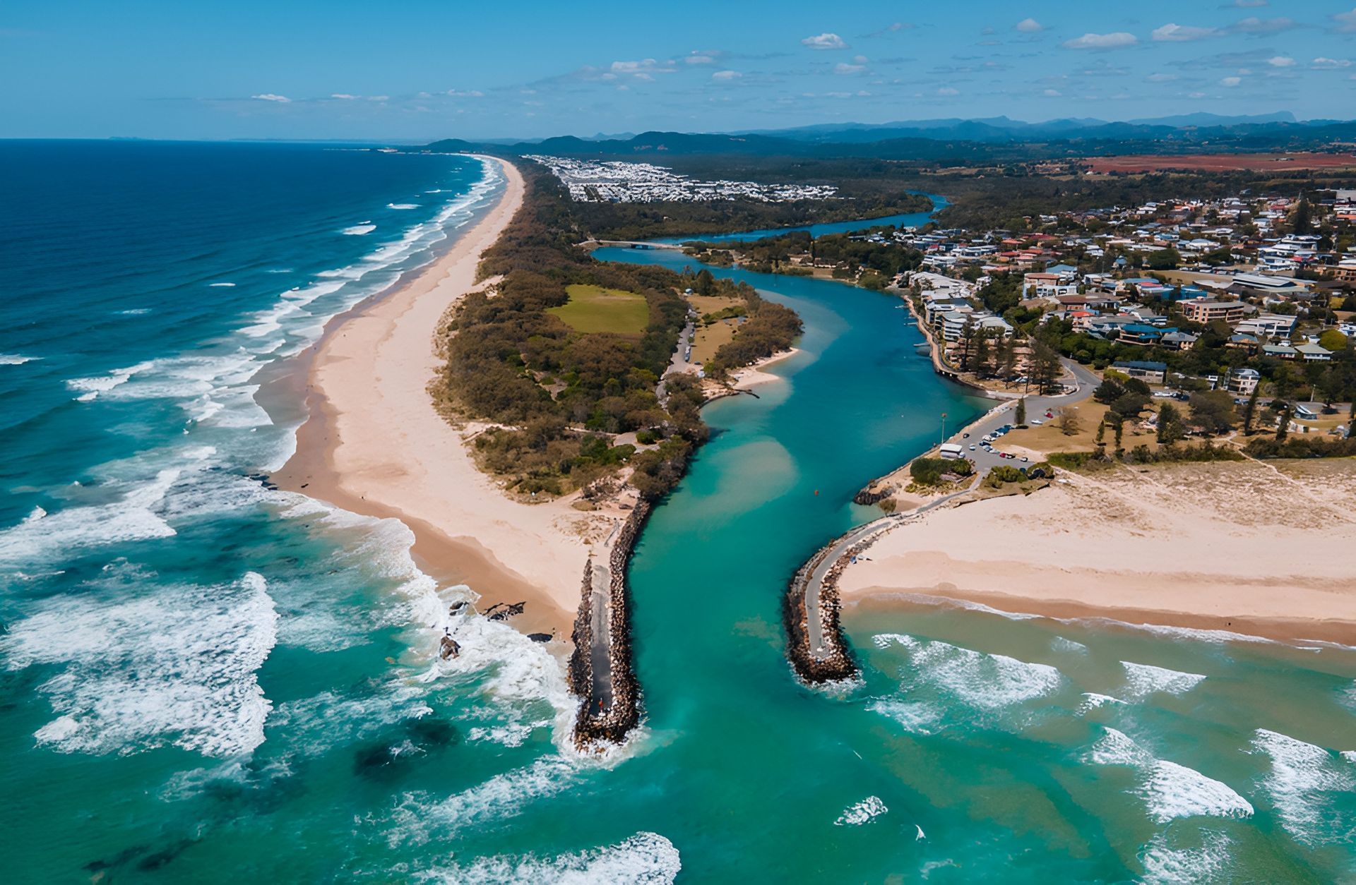 Aerial View of a Beach With Turquoise Water and a River Mouth — Intolec Electrical In Kingscliff, NSW