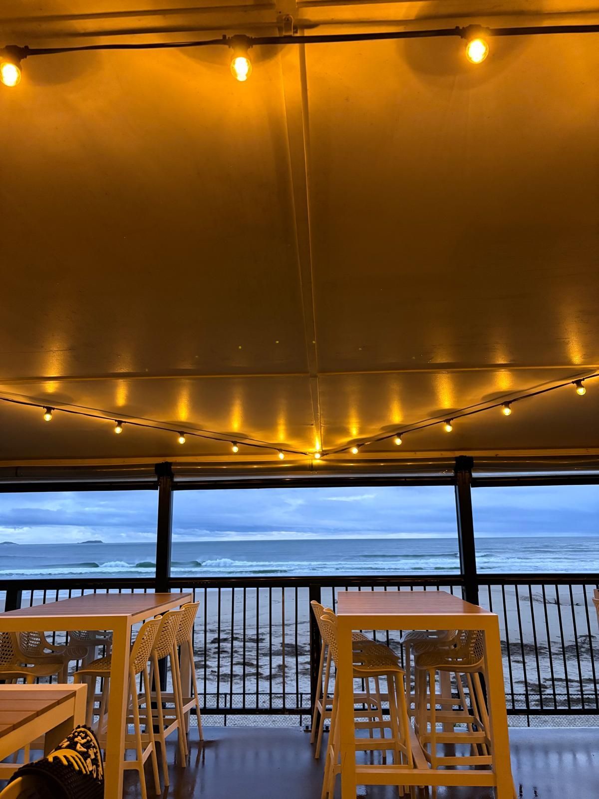 Outdoor Restaurant Seating Overlooking an Ocean — Intolec Electrical in Tweed Heads, NSW