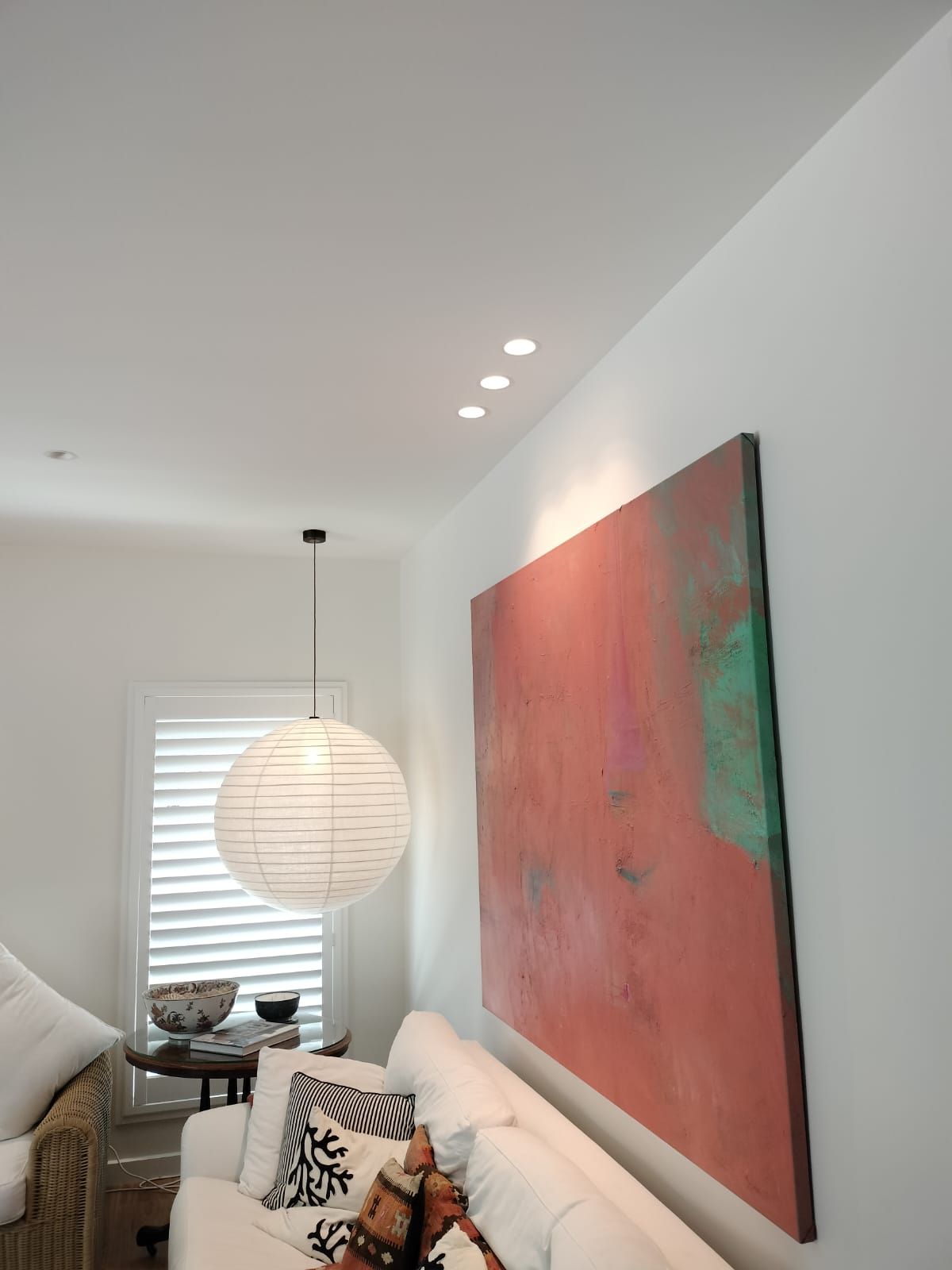 White Living Room With a Large Abstract Painting — Intolec Electrical in Tweed Heads, NSW