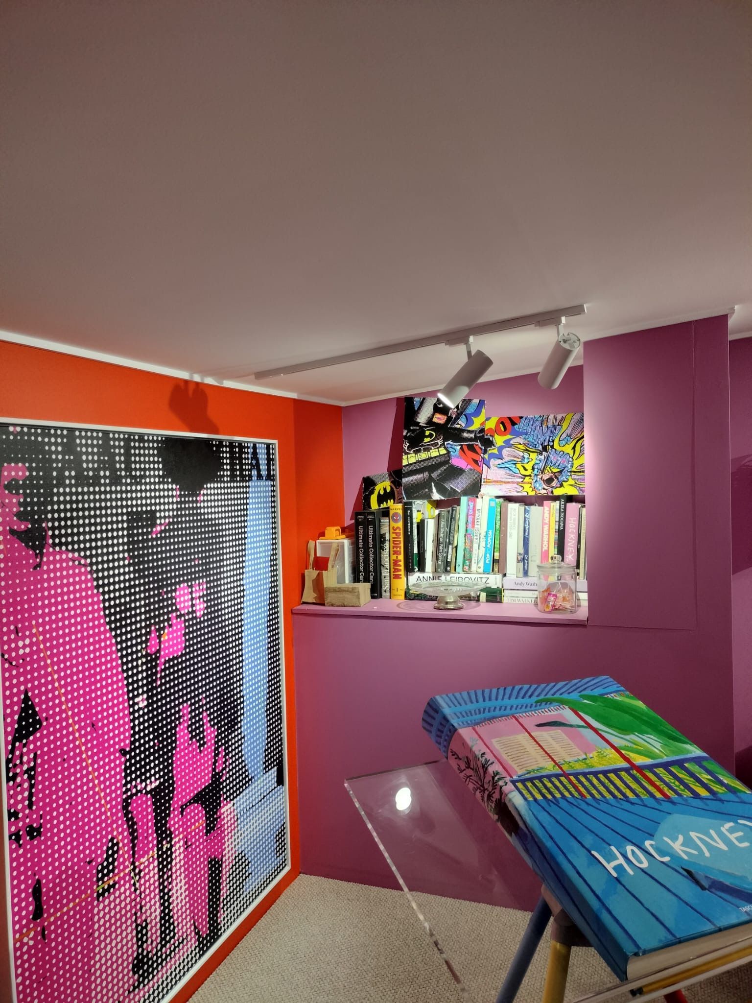 Colorful Art Studio With a Large Artwork, Bookshelf, and a Book on a Stand — Intolec Electrical in Tweed Heads, NSW