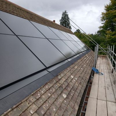Integrated solar panels installed on the roof of a building.