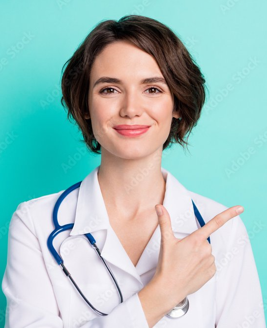 A female doctor is pointing at something with her finger.