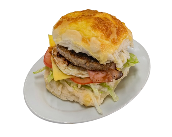 Hamburger on a white plate with lettuce, tomato, cheese, and a patty — Henri's Wodonga Bakery in Wodonga, VIC