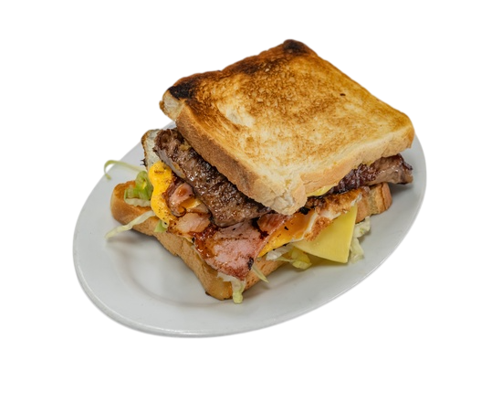 Club sandwich on a white plate: toasted bread, bacon, cheese, lettuce, and grilled meat — Henri's Wodonga Bakery in Wodonga, VIC