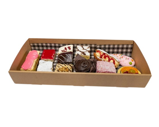 Dessert tray with an assortment of colorful pastries, set on a white surface, brown cardboard container with checkered lining  — Henri's Wodonga Bakery in Wodonga, VIC