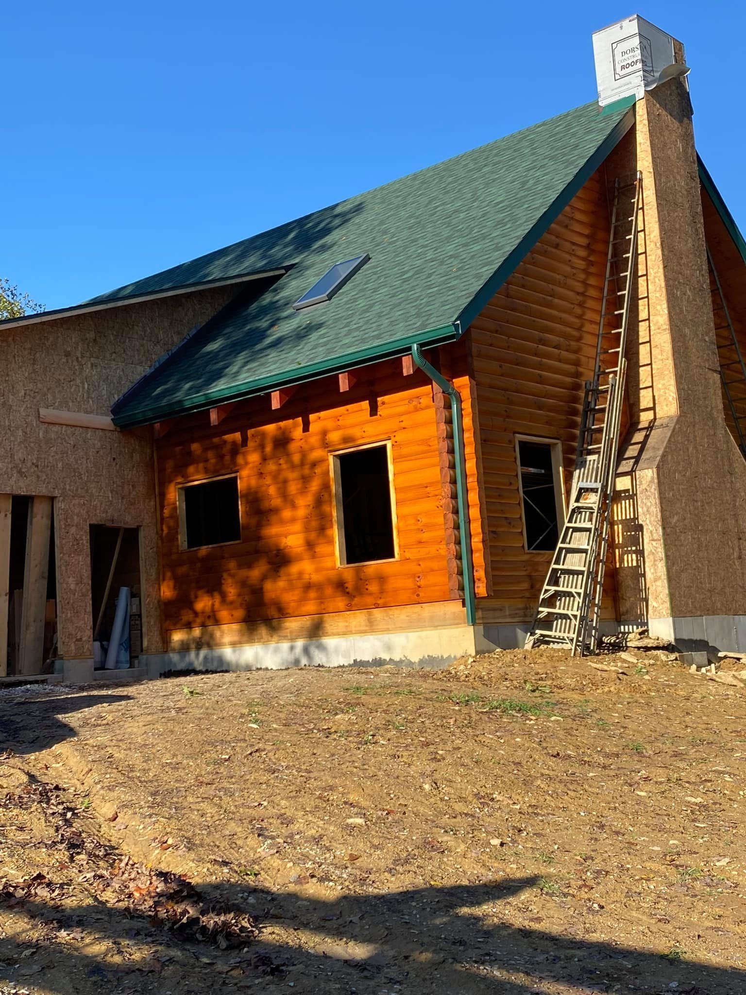 A new roof on a cabin in Independence, KY by Gold Peak Roofing