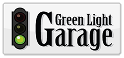 Green Light Garage logo with a traffic light and black-and-green text on a white background