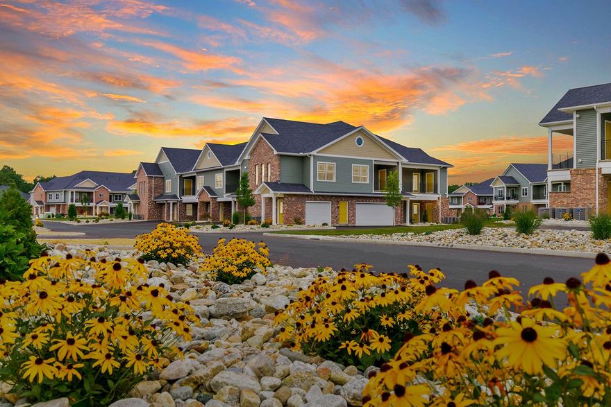 Mayfield Place community photo with flowers in the foreground