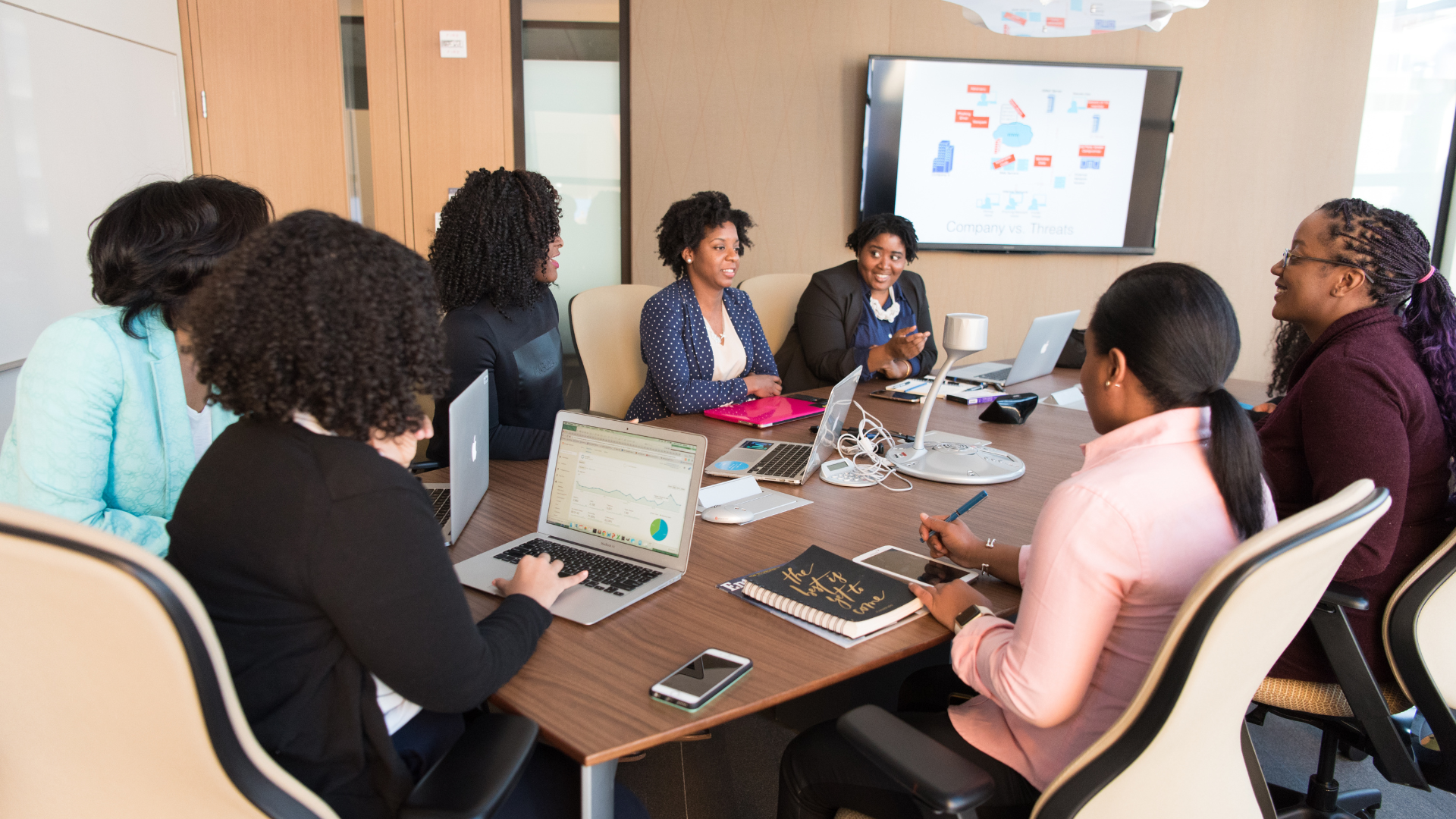 Business professionals collaborating during a team meeting to discuss strategies and business risks
