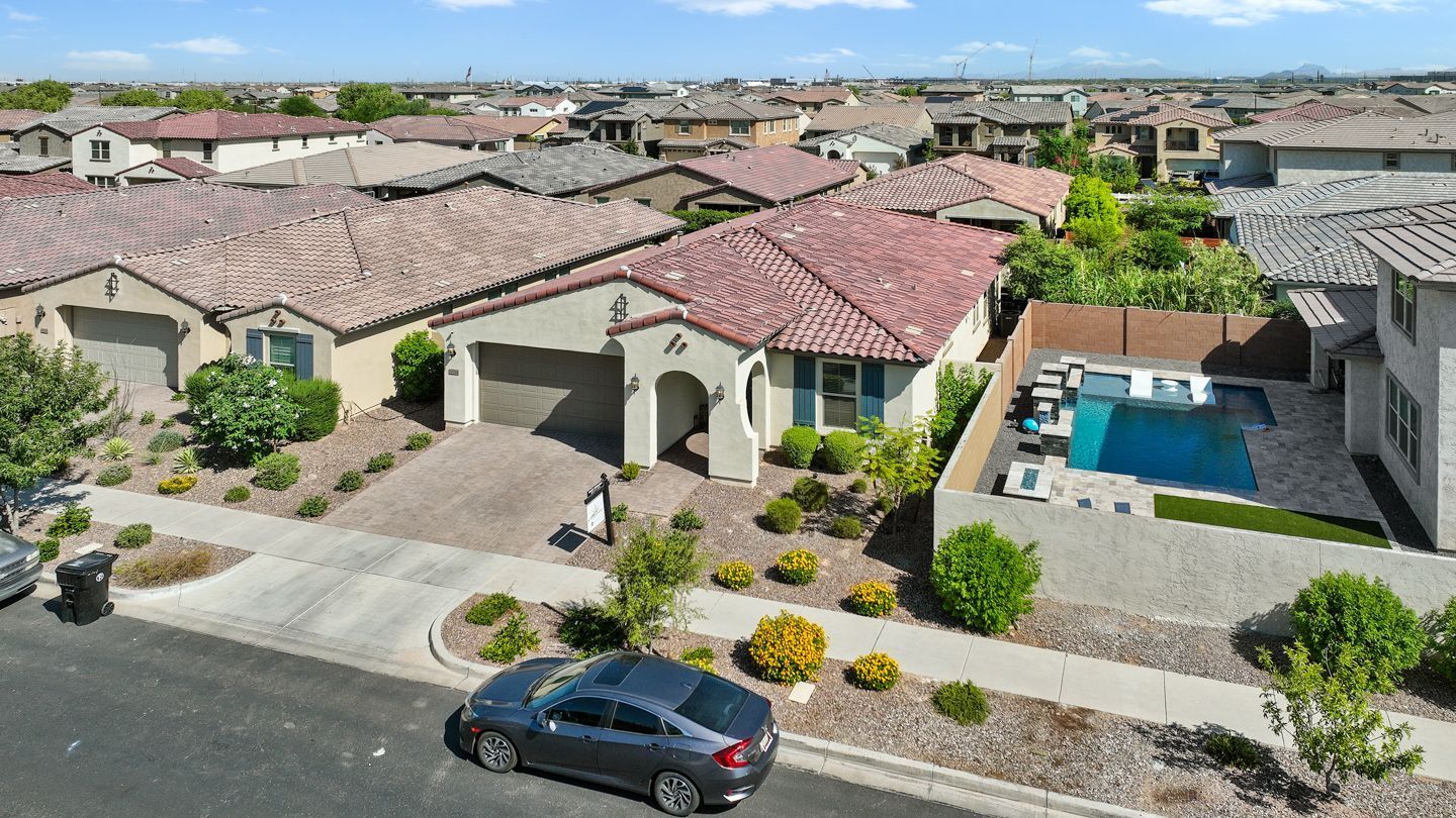 Residential Real Estate Drone Photo by Phoenix Drone Pros Photo by Phoenix Drone Pros, Robert Biggs, An aerial view of a residential neighborhood