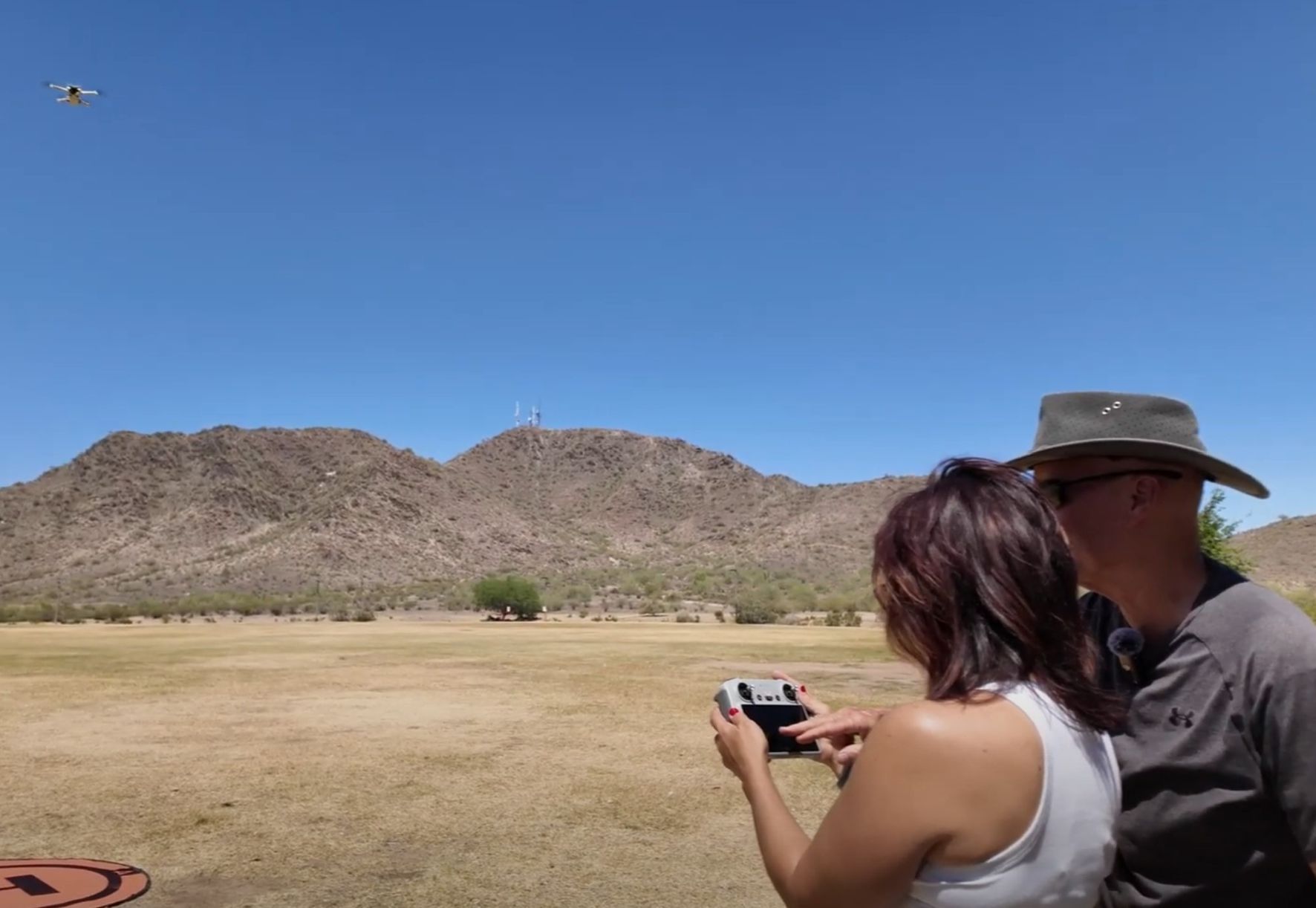 Robert Biggs training a new student to fly a drone