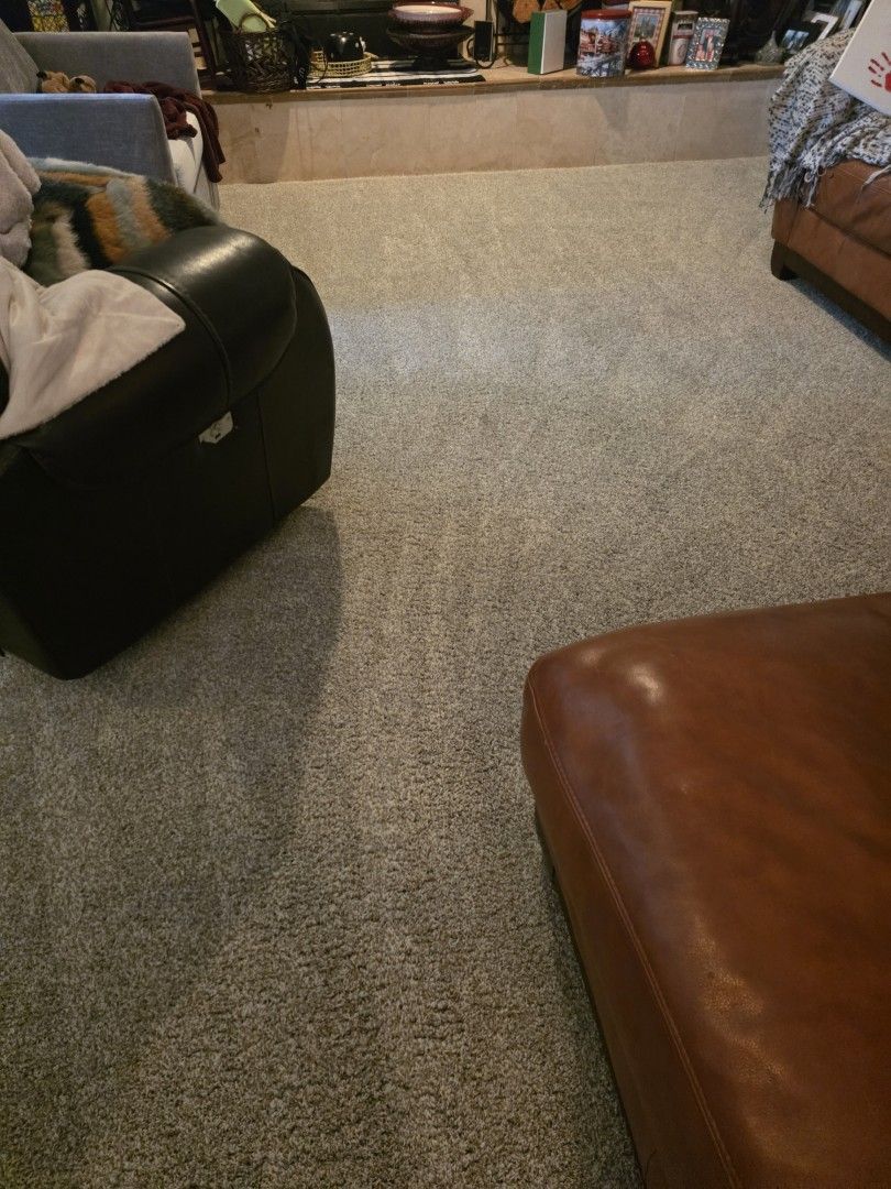 Restored living room carpet with clean uniform pile after deep extraction cleaning