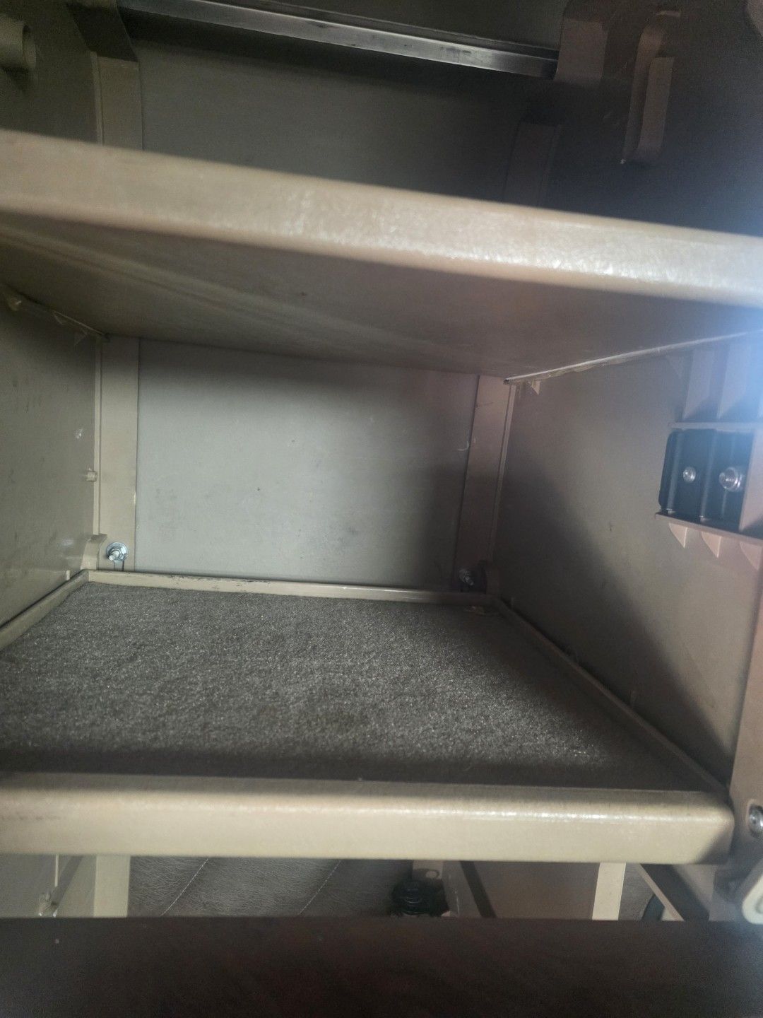 Clean carpet lining a semi truck sleeper storage compartment after carpet cleaning in Largo, FL