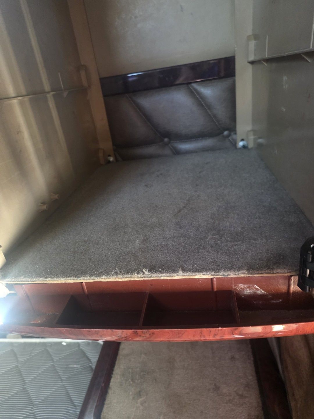 Cleaned carpet on a semi truck sleeper cabinet shelf after hot water extraction in Largo, FL