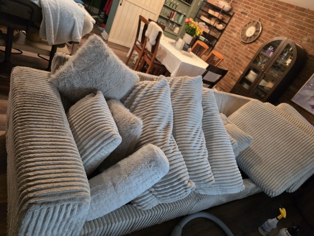 Restored white sectional sofa after professional upholstery cleaning in St. Petersburg, FL