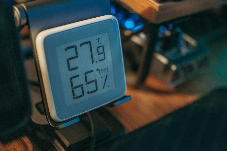 Indoor hygrometer reading 65 percent humidity inside a Largo FL home where moisture can fuel mold growth.
