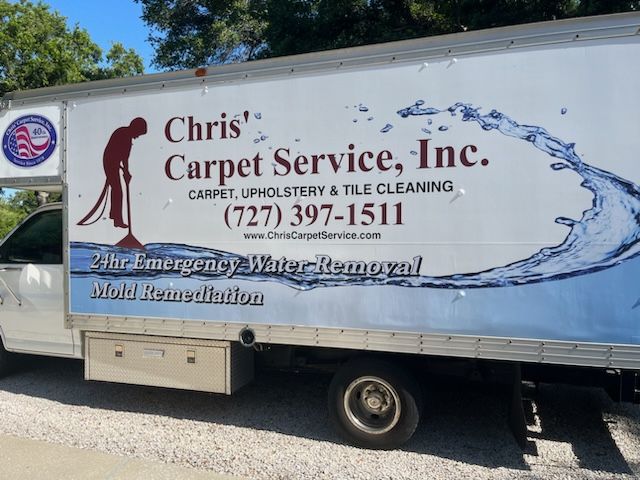 A Chris’ Carpet Service van parked and ready for carpet cleaning in Clearwater, Florida