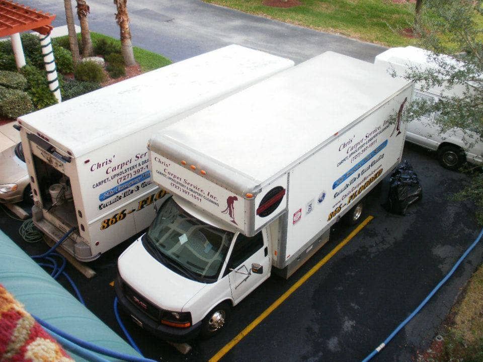 Chris’ Carpet Service company van parked in Largo FL for a sewage damage cleanup project.