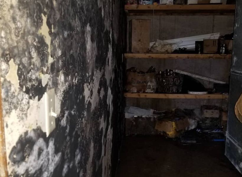 mold damage on the walls in the pantry