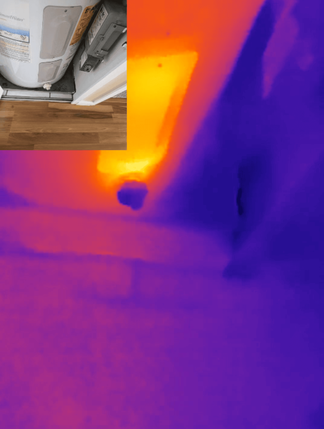 Infrared camera view of hot water tank closet moisture