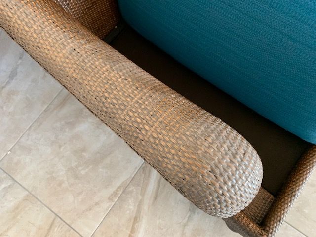 Close-up of a cleaned wicker furniture frame after construction dust removal in Dunedin, FL