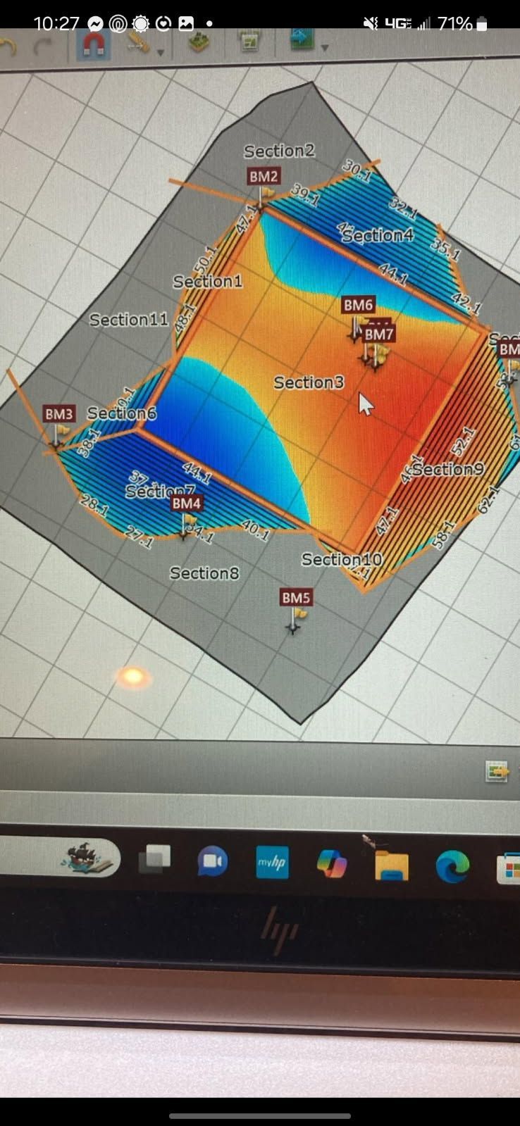 3D heatmap graph on a computer screen with orange, blue, and gray regions and axis labels