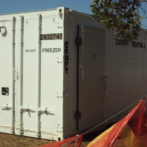 A white portable freezer unit labeled 