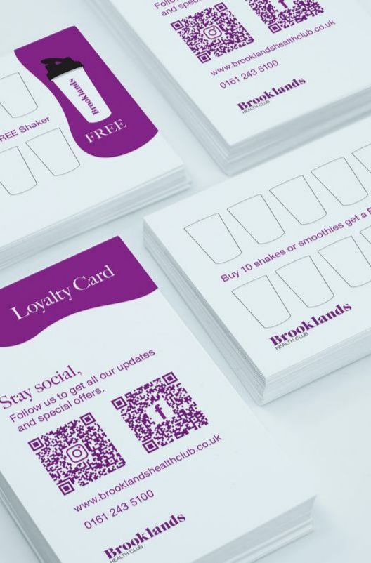 Loyalty cards stacked. Purple details on white, featuring shaker icon.