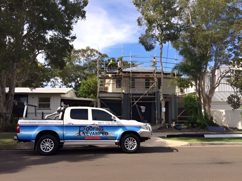 A Truck is Parked in Front of a House Under Construction — Roofing Revamped In Maroochydore, QLD