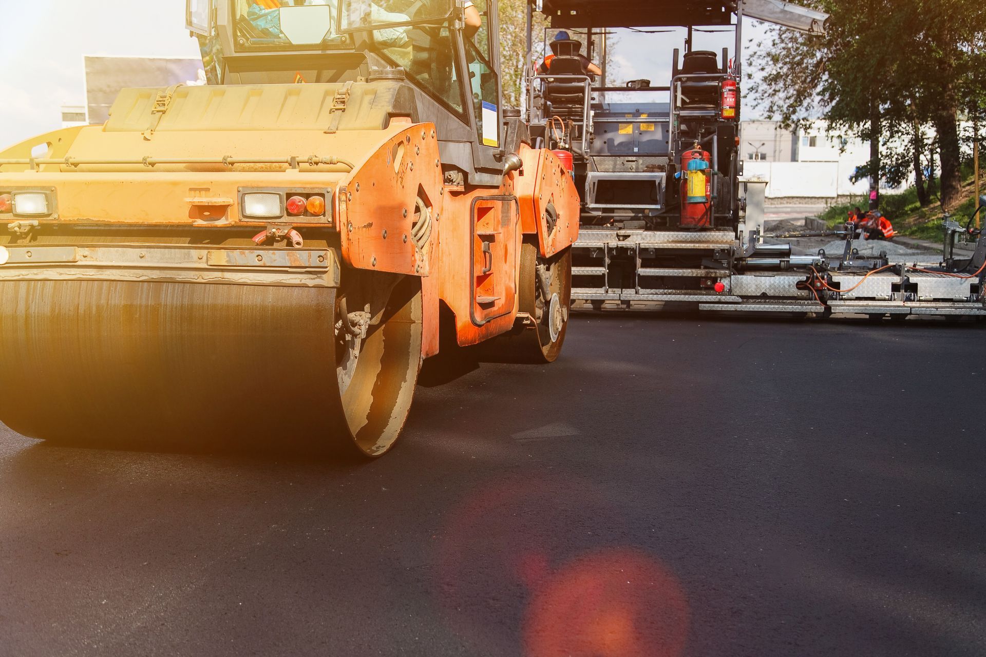 Freshly paved asphalt driveway completed by a professional driveway asphalt services crew. Freshly paved asphalt driveway completed by a professional driveway asphalt services crew.