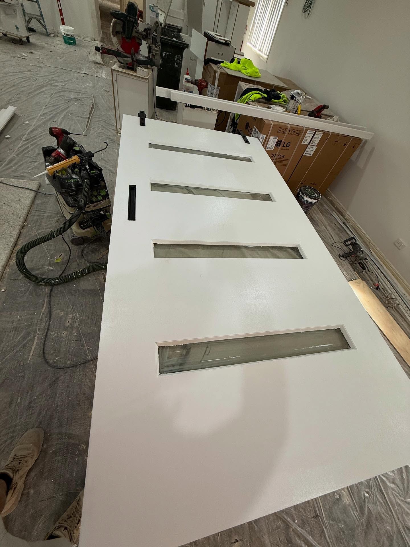 A white door with horizontal glass panels - RAC Carpentry Services in Pimpama, QLD