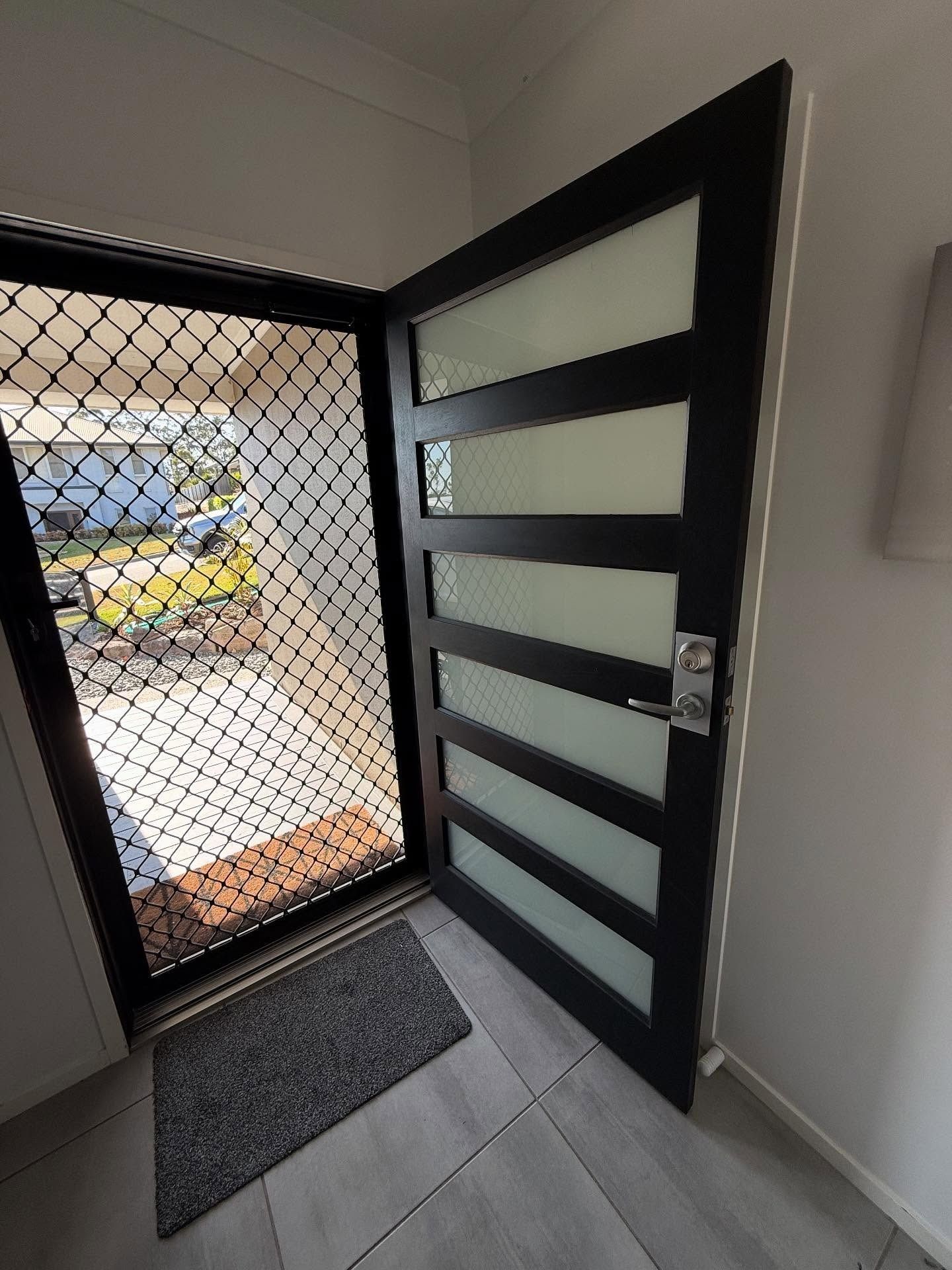 A Gloved Hand Uses a Metal — RAC Carpentry Services in Pimpama, QLD