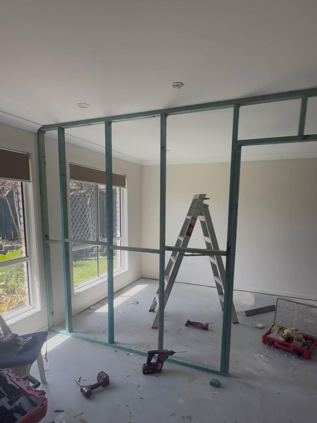 White Door With Rectangular Black Vent — RAC Carpentry Services in Pimpama, QLD