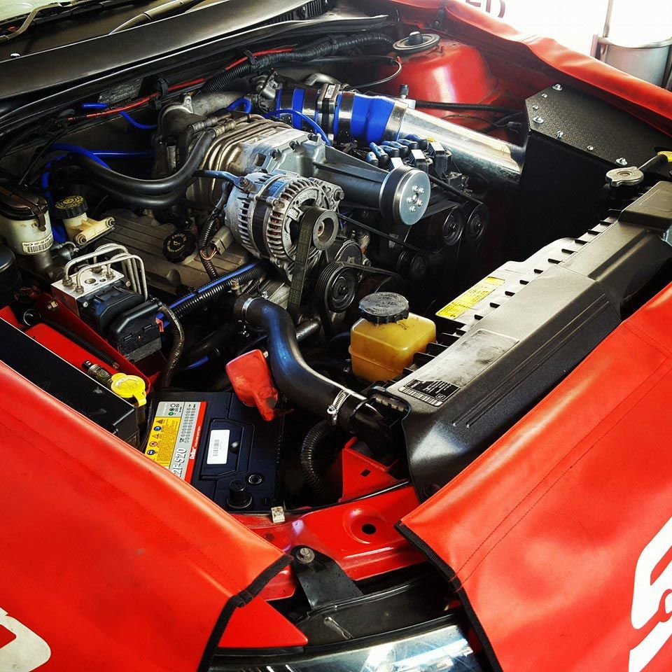 A Close Up of a Car Engine With the Hood Open — Mr Shiny Mechanical in Andergrove, QLD