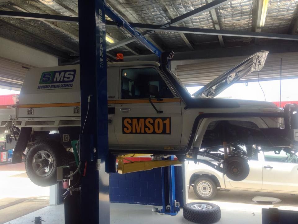 A Truck is Sitting on a Lift in a Garage — Mr Shiny Mechanical in Kuttabul, QLD