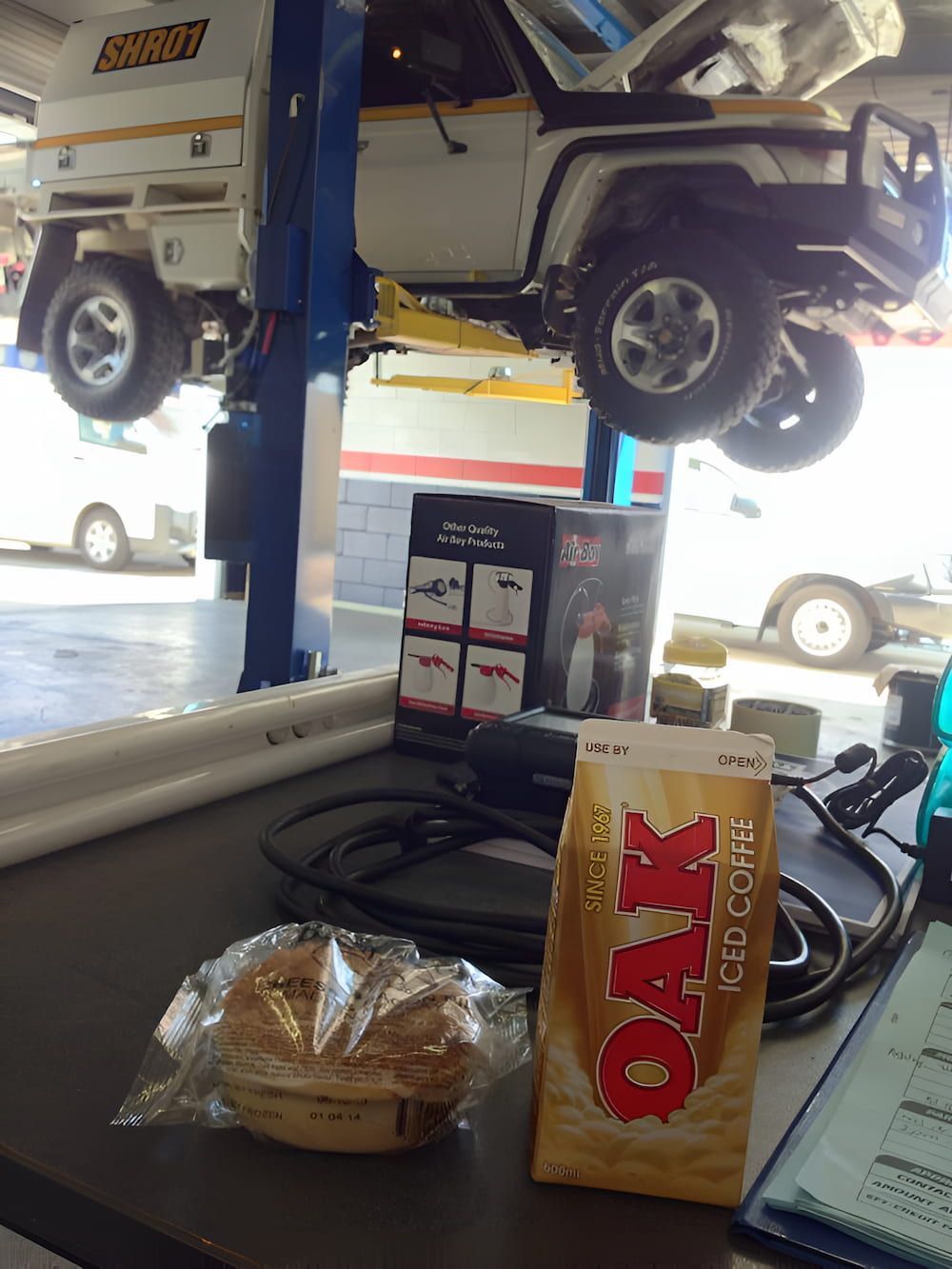 A Box of Oak Sits on a Table Next to a Pie — Mr Shiny Mechanical in Andergrove, QLD